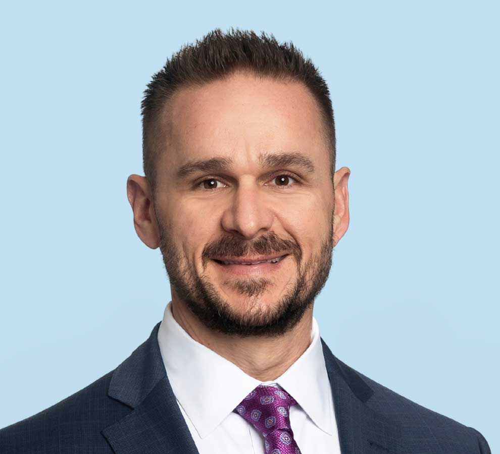 Dr. Christopher E. Baker
